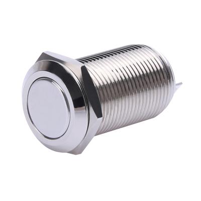 Self locking push button switch